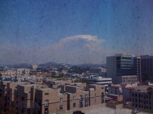 Station Fire through our dirty office window in Koreatown